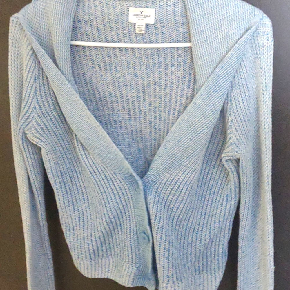 Blue knit button up sweater